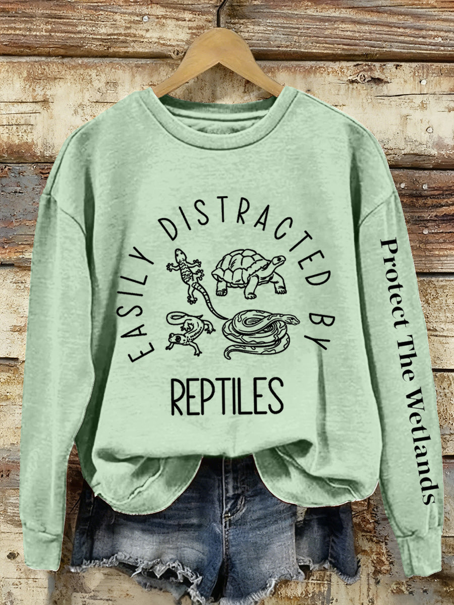 Las mujeres se distraen fácilmente por los reptiles Imprimir Sudadera