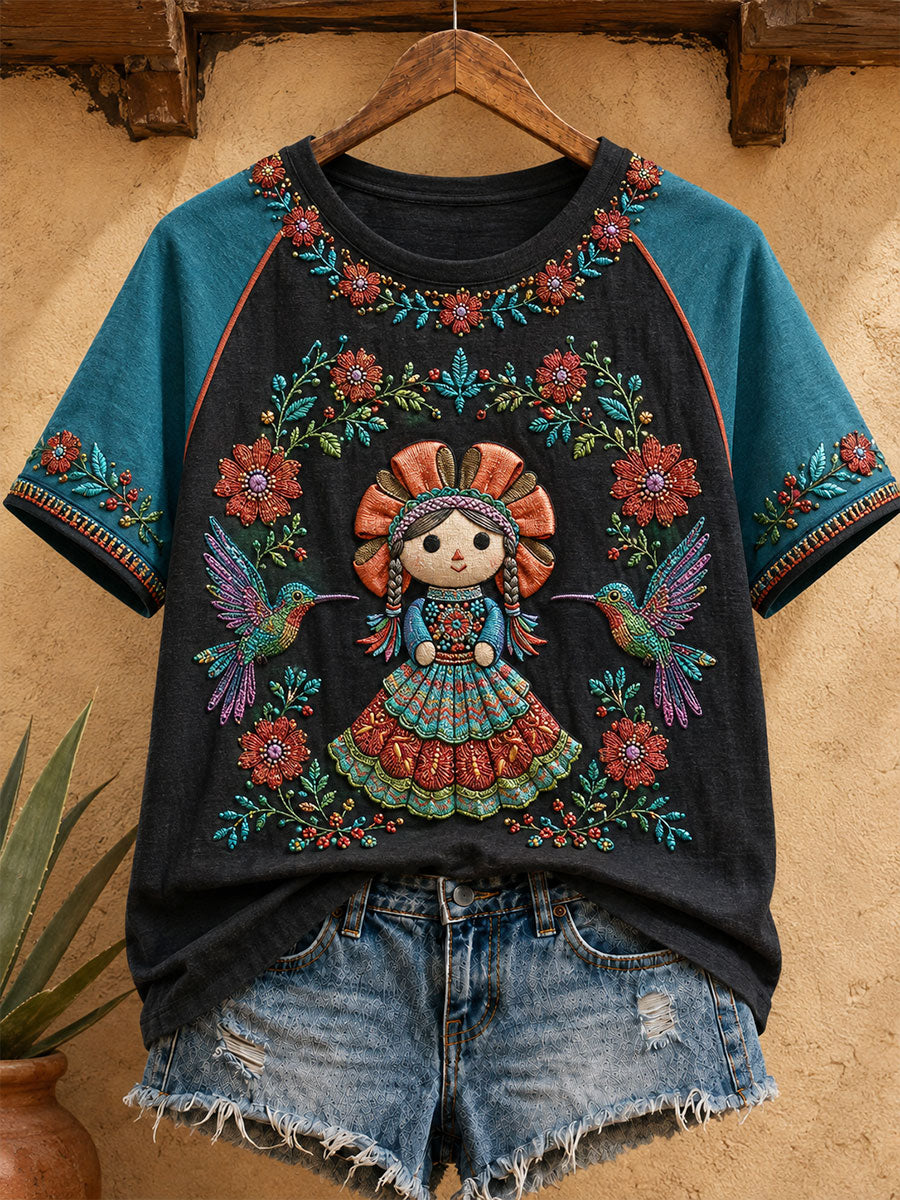 Damen-T-Shirt mit mexikanischer Lele-Puppe und floraler Kunst-Print