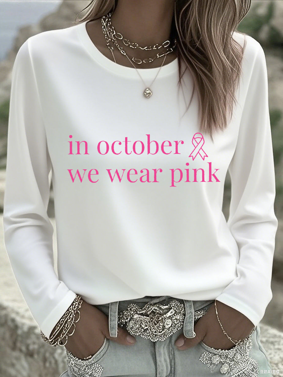 En octubre de las mujeres nos ponemos camiseta de manga larga rosada de la conciencia del cáncer de pecho