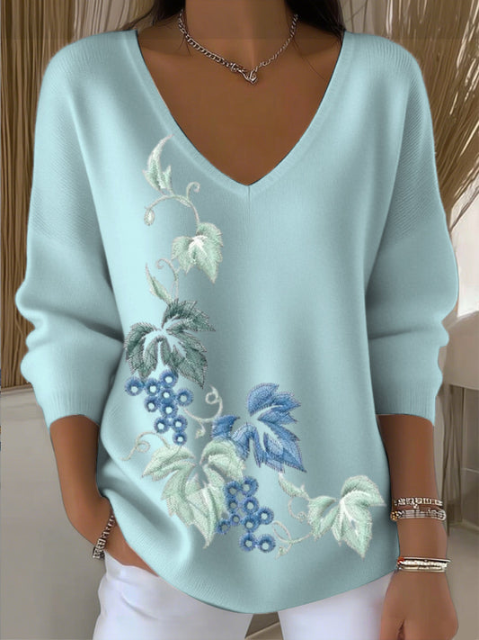 Suéter bordado floral azul lago de mujer