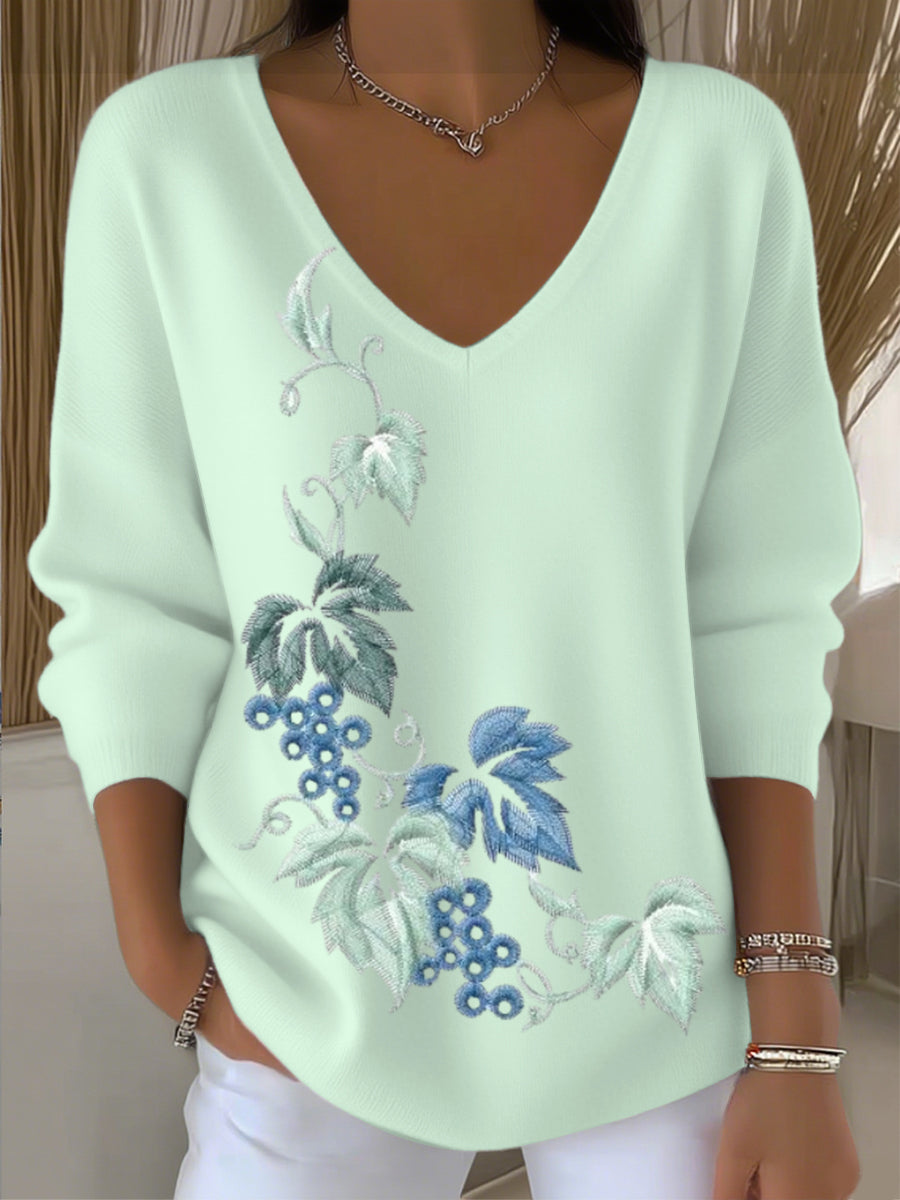 Suéter bordado floral azul lago de mujer