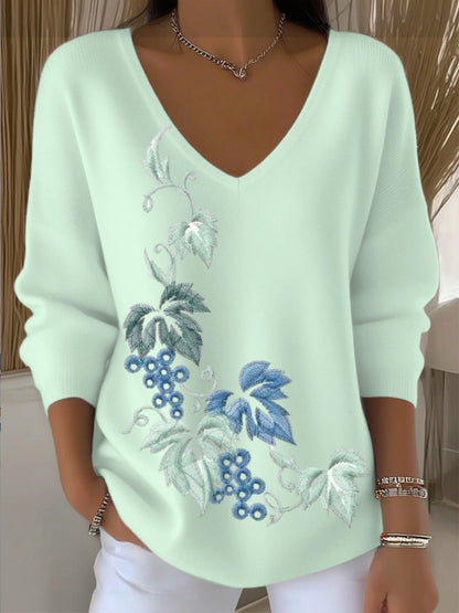 Suéter bordado floral azul lago de mujer