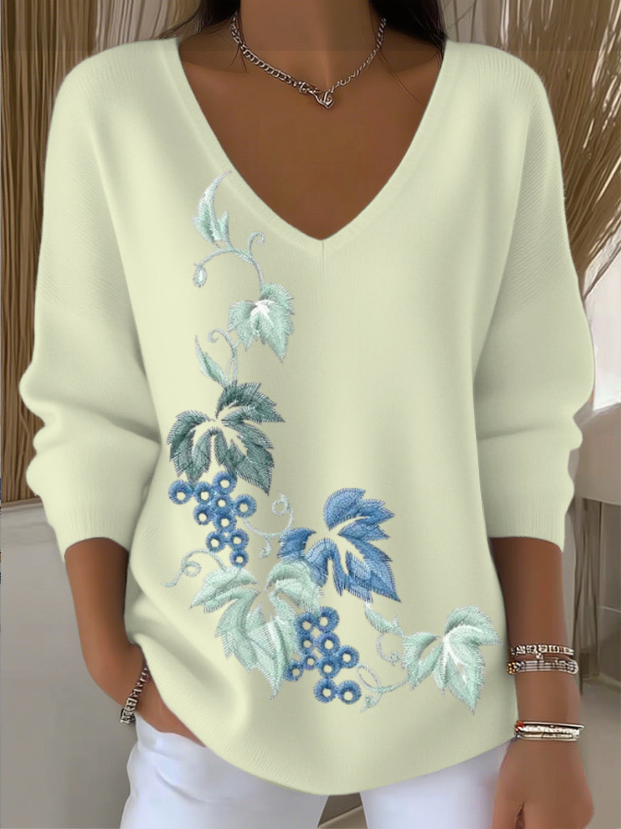 Suéter bordado floral azul lago de mujer