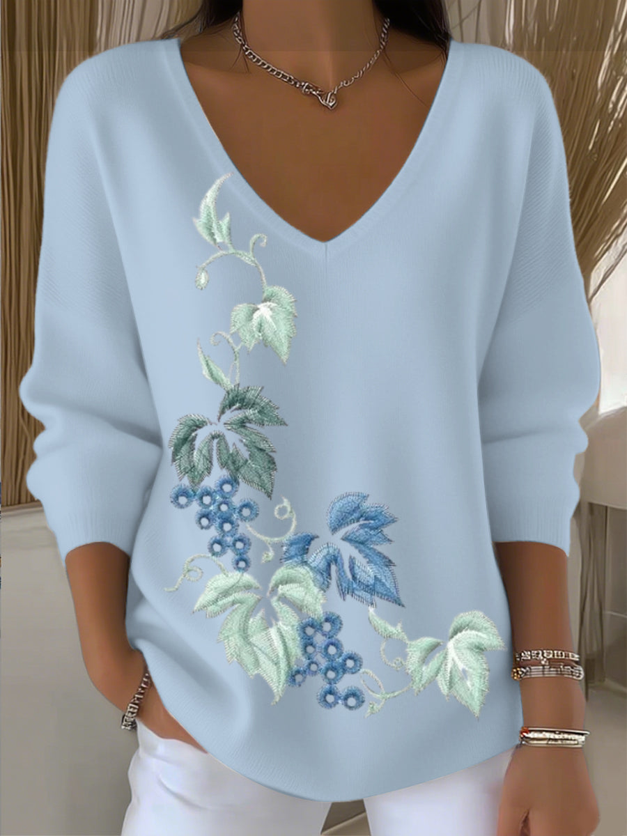 Suéter bordado floral azul lago de mujer
