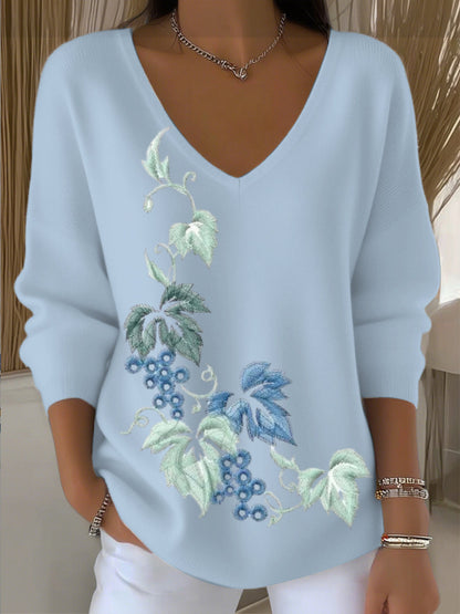 Suéter bordado floral azul lago de mujer