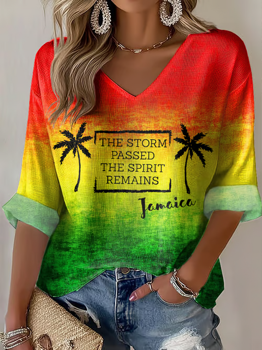 De las mujeres con cuello en V Retro Jamaica fuerte Jamaica la tormenta pasó el espíritu sigue siendo Reggae rojo, verde y oro imprimir camiseta