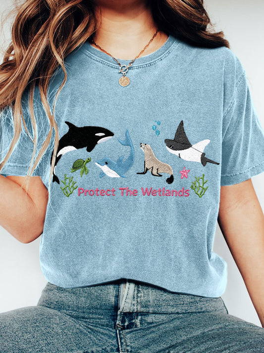 Proteja la camiseta del patrón del bordado de los humedales de las mujeres