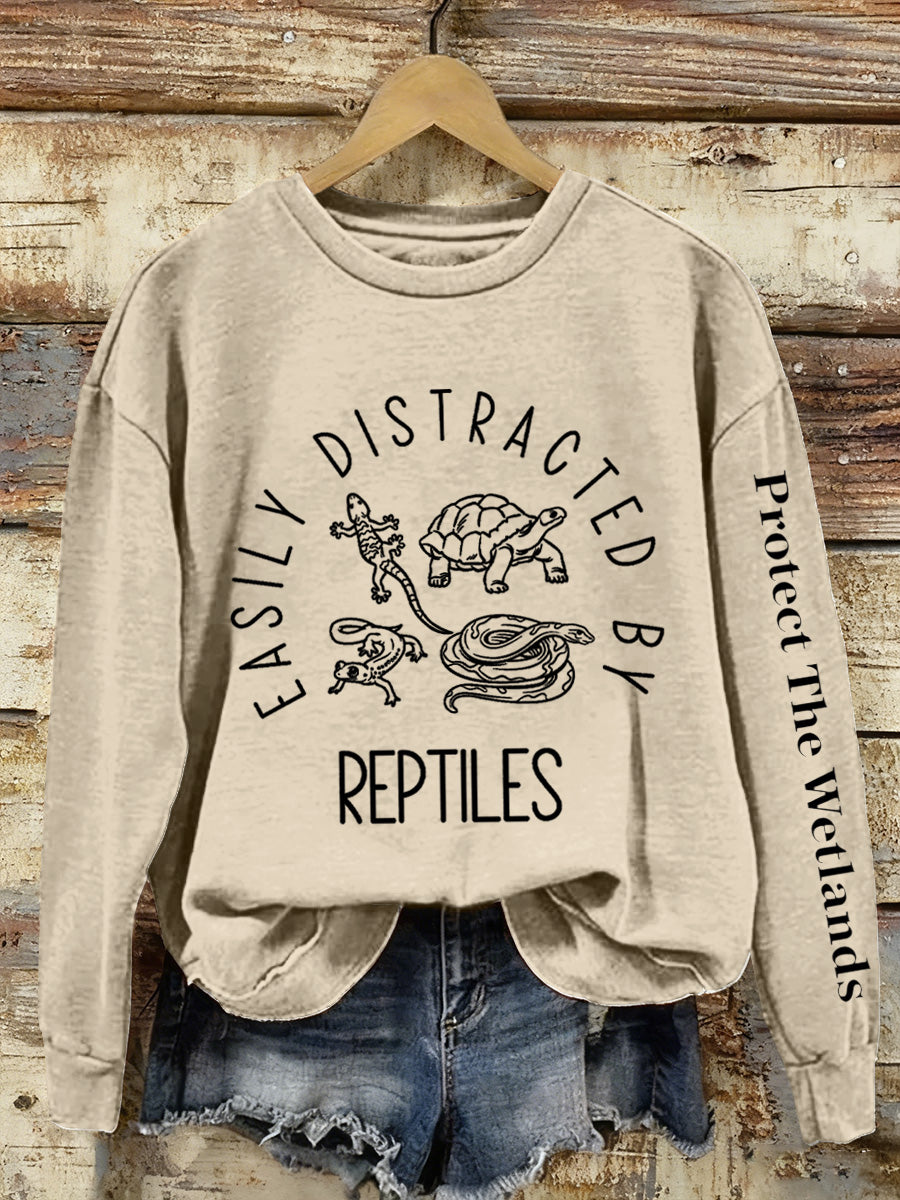 Las mujeres se distraen fácilmente por los reptiles Imprimir Sudadera