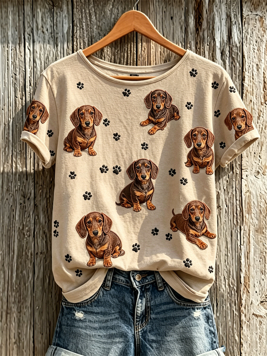 Camiseta de manga corta con estampado para mujer: perros salchicha y huellas de patas