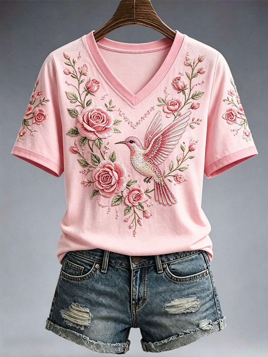 Camiseta de mujer con diseño floral bordado en color rosa