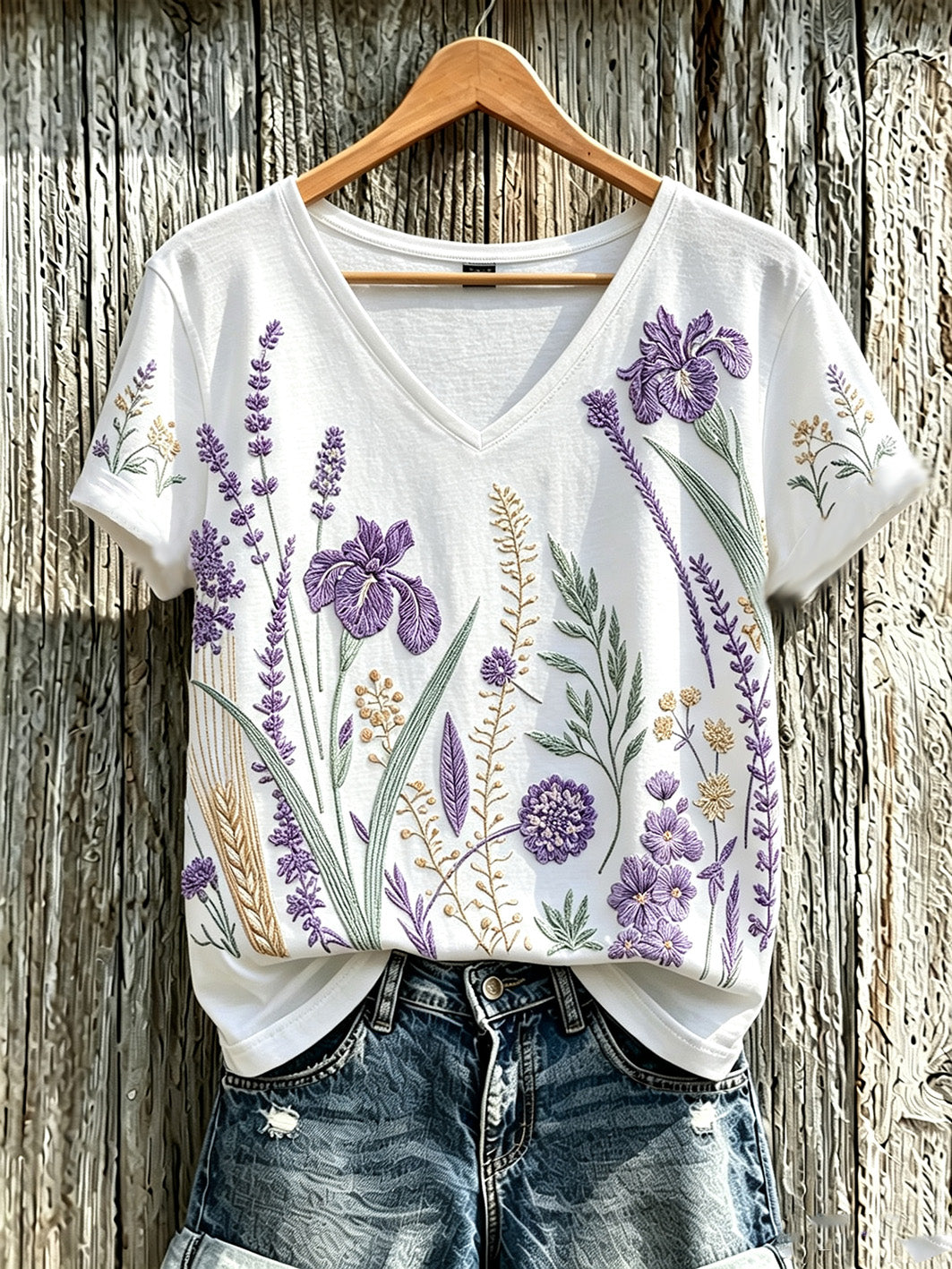 Camiseta casual para mujer con estampado de flores y plantas en color púrpura