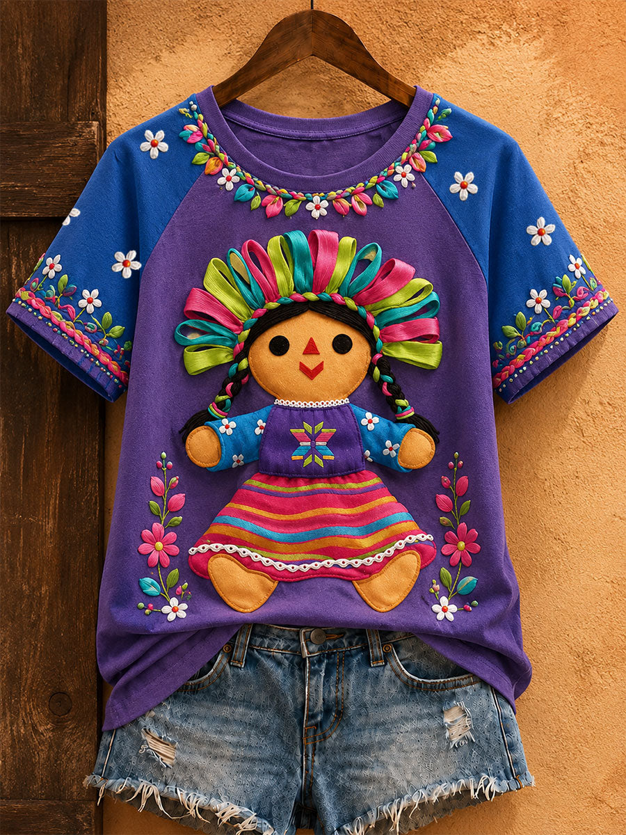 Damen-T-Shirt mit mexikanischer Lele-Puppe und floraler Kunst-Print