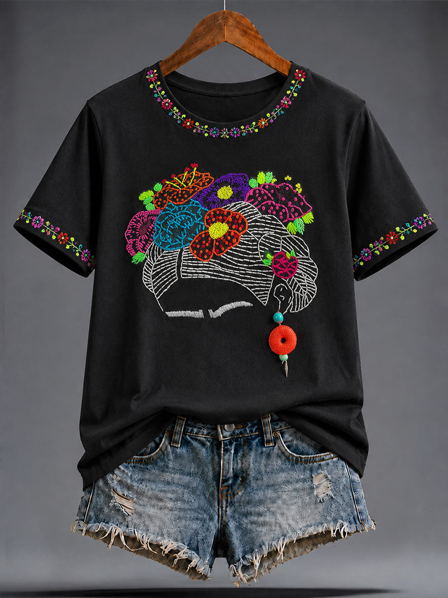 Damen-T-Shirt mit mexikanischer Lele-Puppe und floraler Kunst-Print