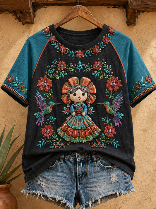 Damen-T-Shirt mit mexikanischer Lele-Puppe und floraler Kunst-Print