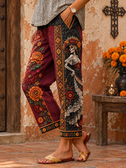 Pantalones estampados con arte floral del Día de los Muertos mexicano para mujer