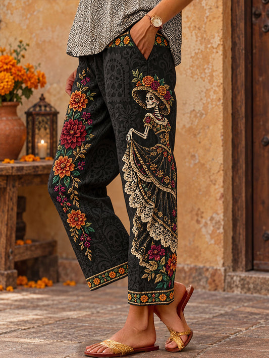 Pantalones estampados con arte floral del Día de los Muertos mexicano para mujer